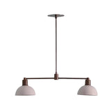 Straight front view of Capri 2 light linear chandelier highlighting its balanced horizontal silhouette, white metal dome shades, and bronze-tone finish.