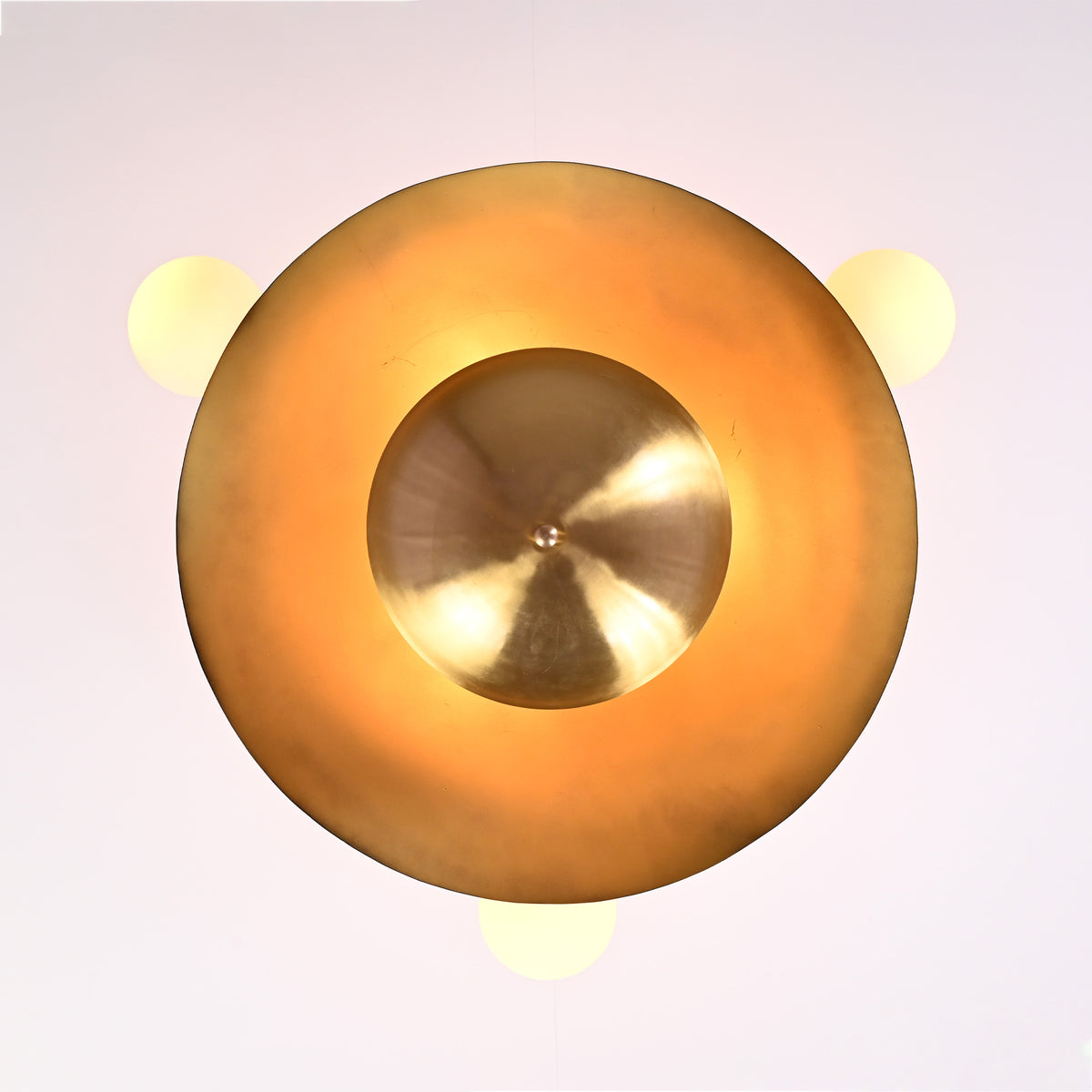 Capri Globe Disc Chandelier top view showing circular disc form, globe lights, and central bowl accent.