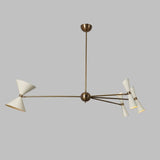 Front view of the Catania 8-light sculptural chandelier featuring ivory double-cone shades, elongated brass-tone arms, a rounded central hub, and an elegant asymmetric silhouette.