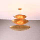 Wide view of Celeste Triple Saucer Pendant Light with sculptural stacked shades and clean ceiling profile.