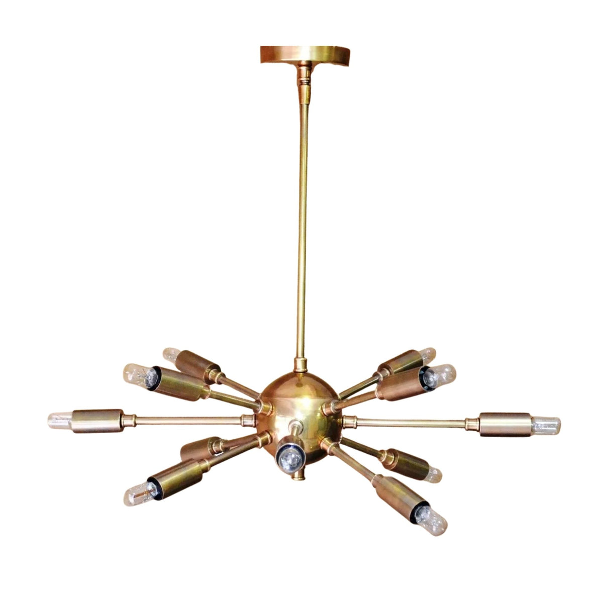 Chicago 12 light Mid-Century Modern Sputnik chandelier shown from the front with brass-tone arms, cylindrical holders, and exposed bulbs.