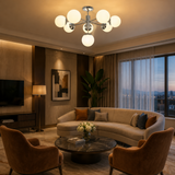 Como 8 light opal glass globe Sputnik chandelier installed in an elegant contemporary living room with warm ambient lighting.