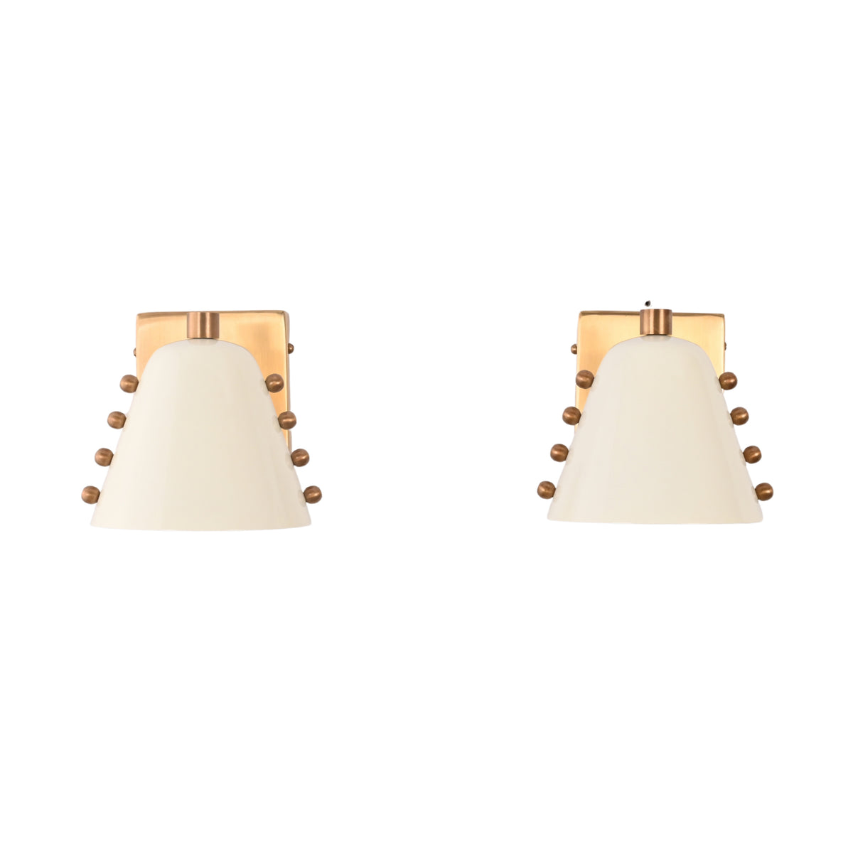 Brass Leaf Studio set of two wall sconces with white shades, warm glow, and refined decorative details