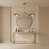 Cordoba 2 light brass linear chandelier shown from an angled view with sculptural curved arms and wide dome shades.