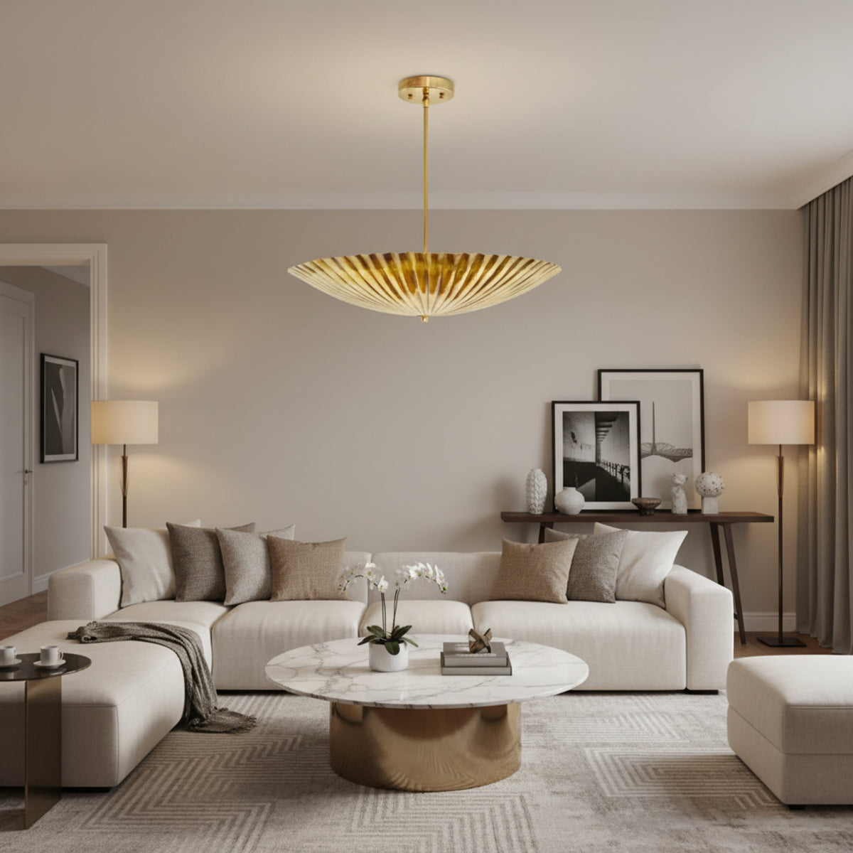 Crete 5 light brass fluted bowl chandelier shown from the front with a wide sculptural shade, slim suspension rod and round canopy.