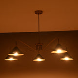 Customizable modern brass chandelier with five black cone shades, ideal for dining rooms and offices.