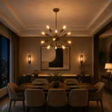 Dallas 12 light antique brass Sputnik chandelier illuminated above a dining table in a warm contemporary dining room.