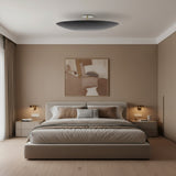Denver 5 light black disc chandelier shown from the front highlighting its minimalist shallow bowl form and perforated surface details.