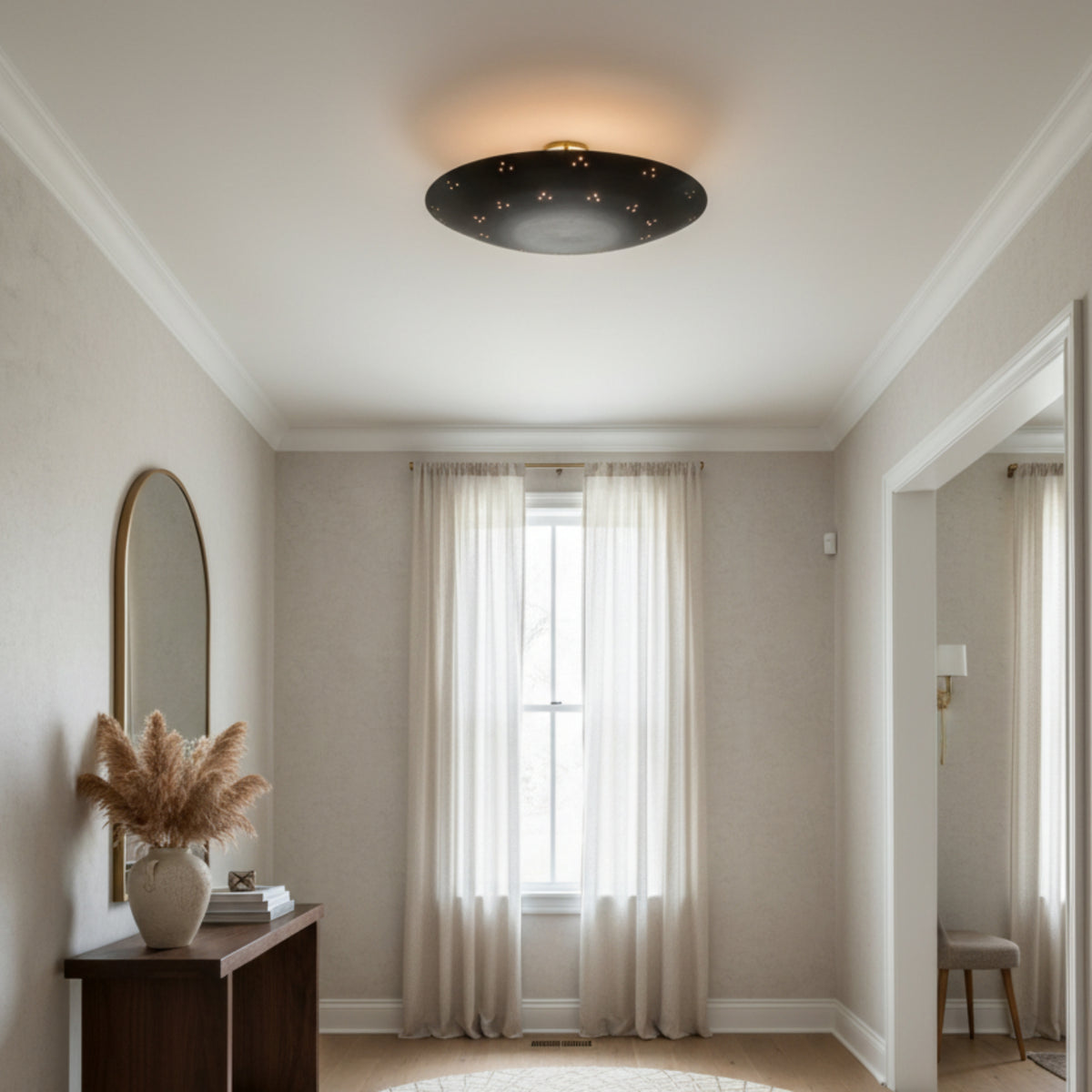 Denver 5 light Mid-Century Modern disc chandelier shown from the front with a broad black bowl silhouette and short ceiling stem.
