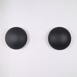 Front view of the Eclipse modern black dome wall sconce featuring a minimalist circular metal shade with a sleek matte black finish.