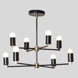 Angled view of the Edinburgh 8 light black and brass chandelier with geometric multi-arm construction and globe bulbs.