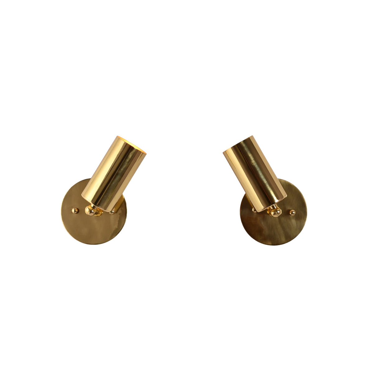 Milan adjustable antique brass cylinder wall sconce with minimalist cylindrical spotlight shade and round wall backplate, modern brass wall light.