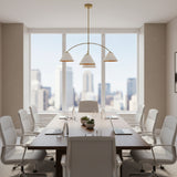 Genoa 4 light sculptural chandelier with white cone shades and warm brass interiors shown illuminated from an angled view.