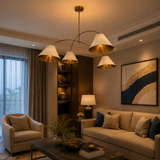 Genoa 4 light white and brass cone chandelier displayed in an elegant contemporary living room with warm ambient lighting.