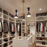 Hamburg 6 light Sputnik chandelier shown from the side highlighting navy blue double-cone shades and brass arms.