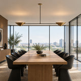 Rear view of the Hamburg 2 light linear chandelier highlighting the sculptural brass cone shades and minimalist frame.