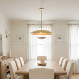 Hamptons 3 light brass-tone sculptural dome chandelier shown from the front with a wide shallow shade and suspended lower bowl.