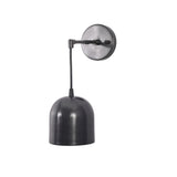 Angled front view of Harlow modern black dome wall sconce with handcrafted rounded metal shade and minimalist profile.