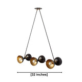Helsinki 6 light black and brass linear chandelier dimension view showing an overall width of 32 inches.