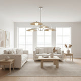 Hobart 4 light layered disc chandelier shown from the front with cream shades, white globe diffusers, and polished silver-tone arms.