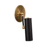 Side perspective of the Hudson adjustable wall sconce featuring a black cylindrical metal shade, adjustable brass arm, and round brass wall plate.