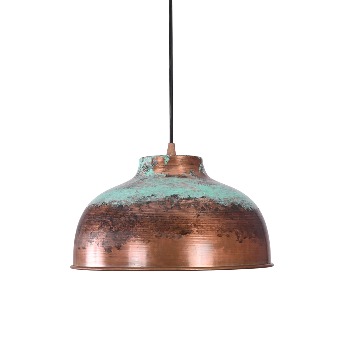 Close-up of the Hudson aged copper dome pendant light highlighting the handcrafted copper surface, authentic verdigris patina, and artisan metal detailing.