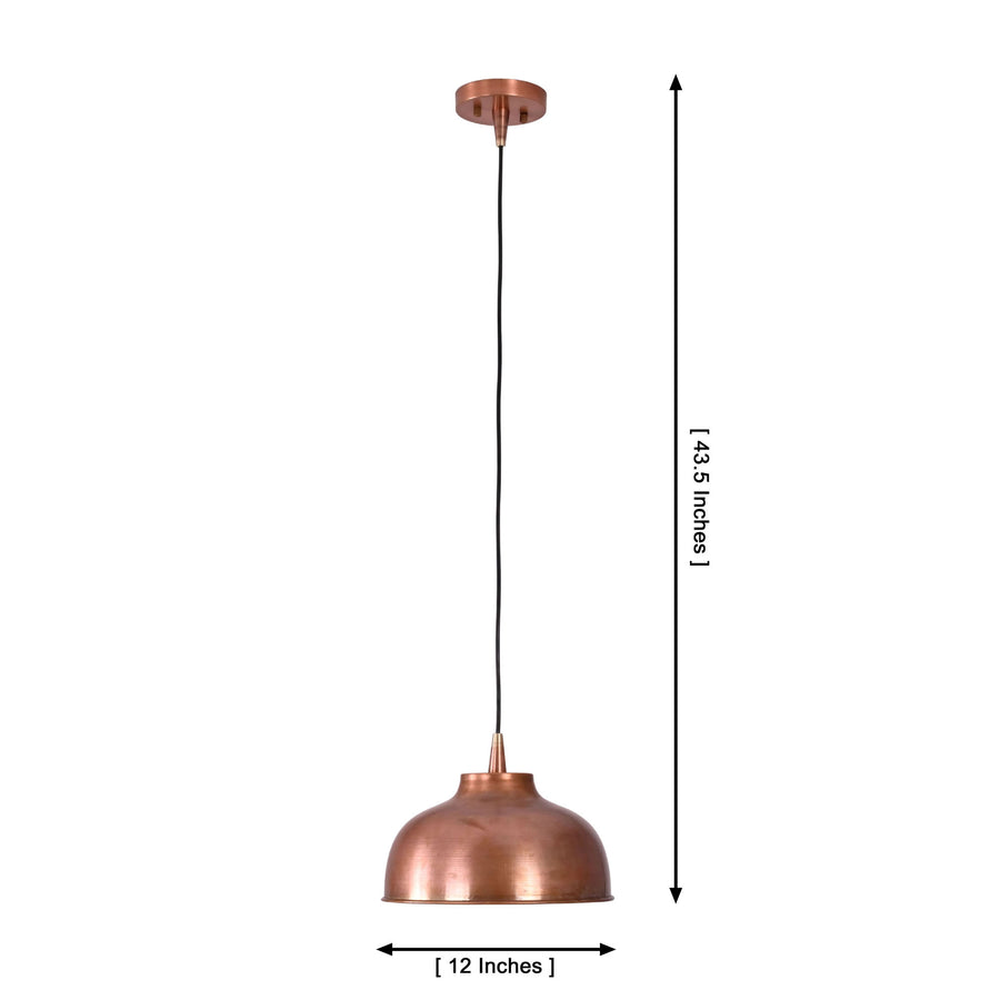 Hudson copper dome pendant light installed above a modern wooden dining table in a contemporary dining room.