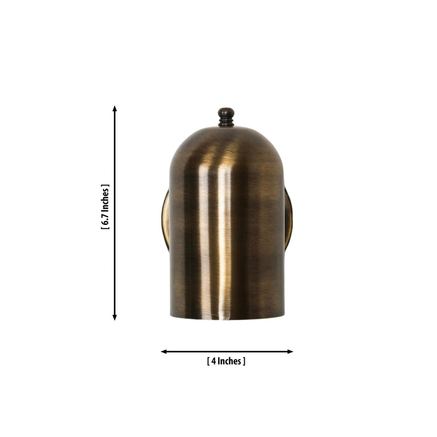 Hudson Dome Wall Sconce installed in a modern hallway, providing warm downward accent lighting above a console table in a contemporary minimalist interior.