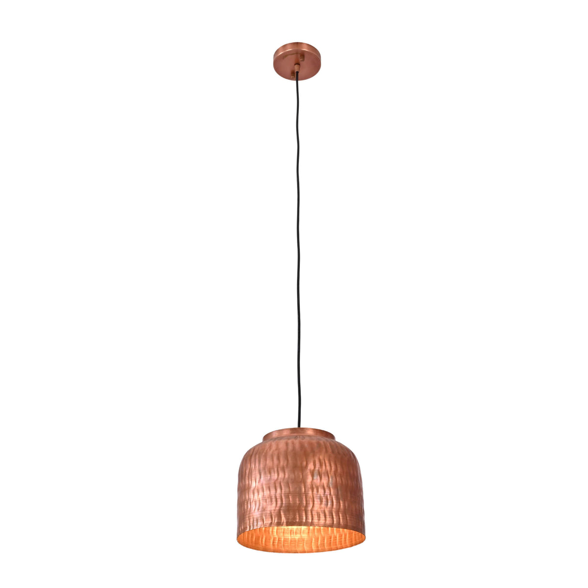 Hudson hammered dome pendant light illuminated showing warm downward ambient lighting and textured copper finish