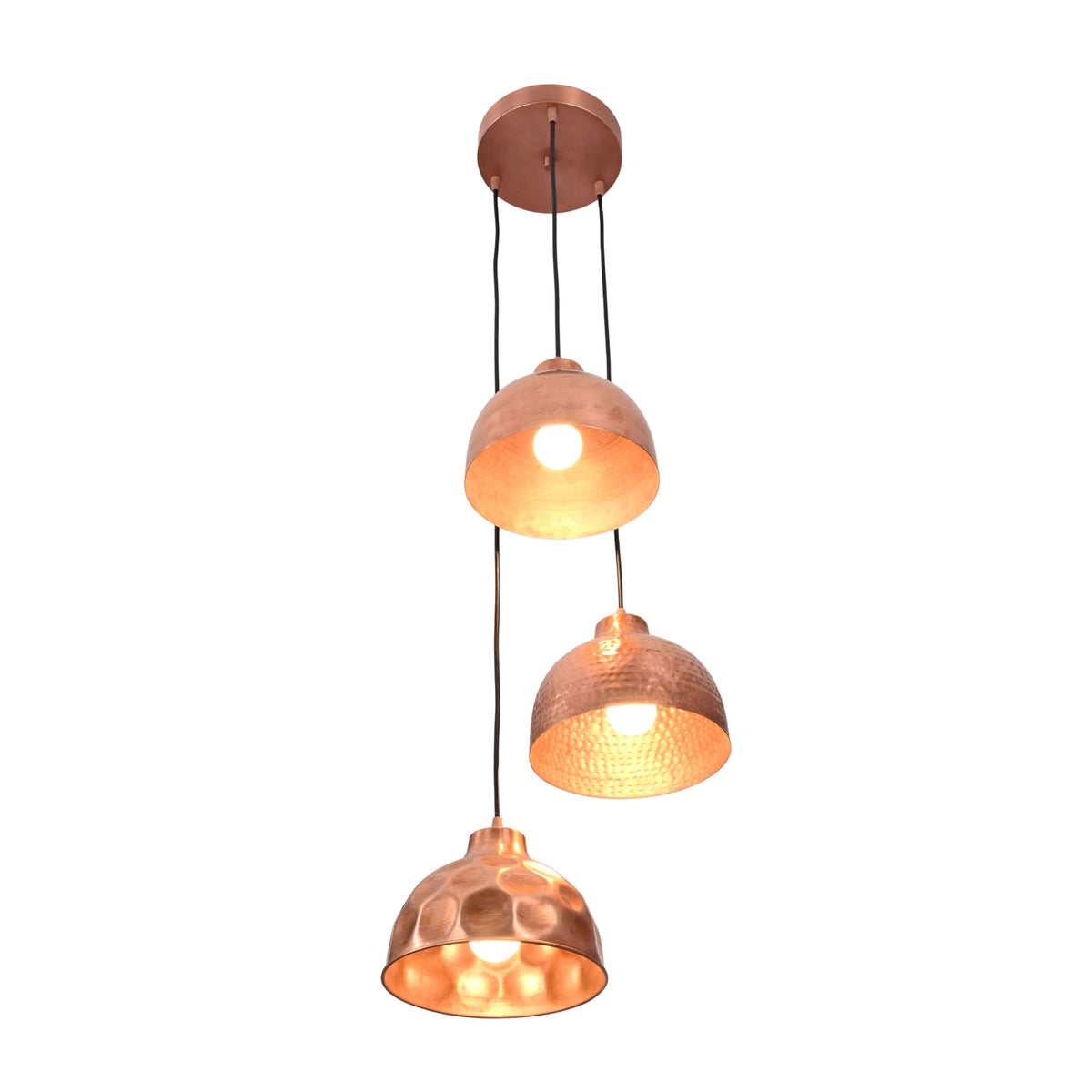 Angled view of Hudson modern copper three shade cluster pendant light featuring handcrafted mixed copper dome shades