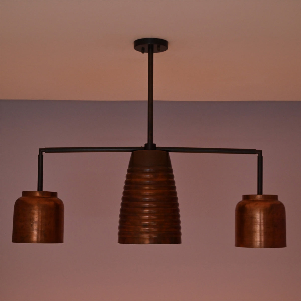 Unlit Hudson Modern Linear Three Shade Chandelier featuring a ribbed center shade, two cylindrical side shades, and a minimalist linear frame.