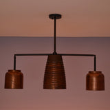 Unlit Hudson Modern Linear Three Shade Chandelier featuring a ribbed center shade, two cylindrical side shades, and a minimalist linear frame.