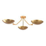 Angled front perspective of Hudson brass triple dish chandelier highlighting the sculptural curved arms and handcrafted dish shades.