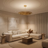 Kyoto 5 light brass-tone perforated disc chandelier shown from an angled view with a wide sculptural bowl profile.