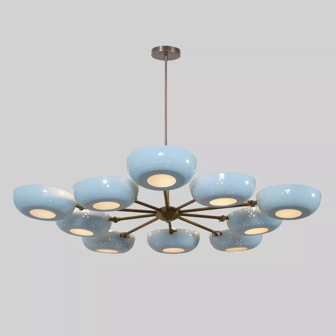 Front view of the Lecce 10-light chandelier showcasing rounded sky-blue bowl shades, warm brass-tone metal arms, and a central downrod suspension.