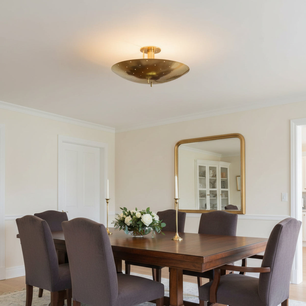 Lecce 1 light Mid-Century Modern brass bowl ceiling light featuring perforated detailing and a compact flush mount design.