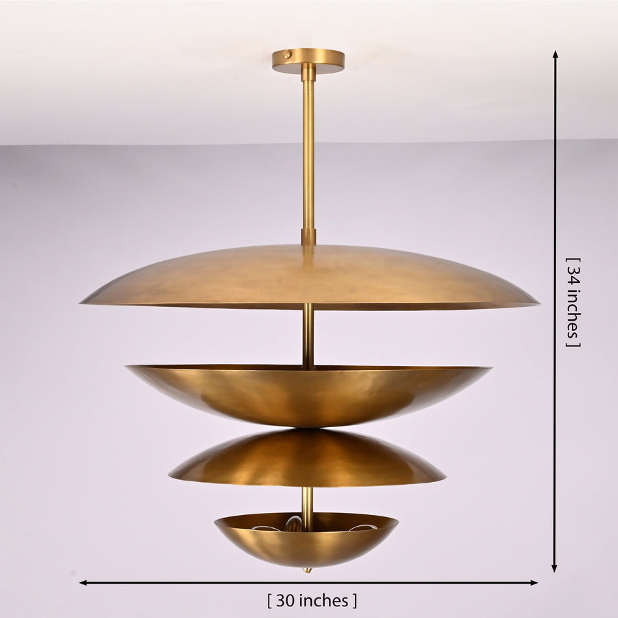 Lior Modern Tiered Disc Chandelier installed in a contemporary living room creating a sculptural Scandinavian statement with warm ambient lighting