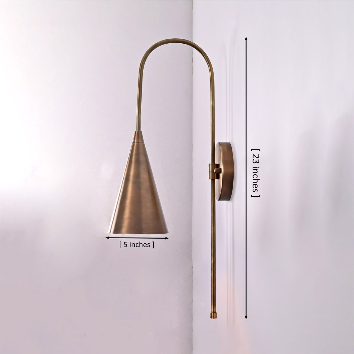 Liora Cone Loop Wall Sconce shown with 5 inch shade width and 23 inch overall height dimensions.