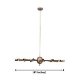 Lucca 18 light Mid-Century Modern starburst Sputnik chandelier with black radial arms and brass-tone socket holders shown on a white background.