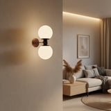 Luna 2 light wall sconce with vertically arranged opal white glass globe shades and dark metal frame – Model 32837