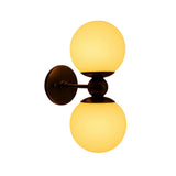 Luna double globe 2 light wall sconce with opal glass shades illuminated in warm light – Model 32837