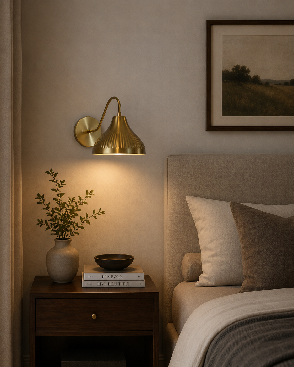 Luna Fluted Dome Wall Sconce installed beside a modern bedroom, providing warm ambient lighting with its handcrafted fluted brass shade and elegant curved arm.