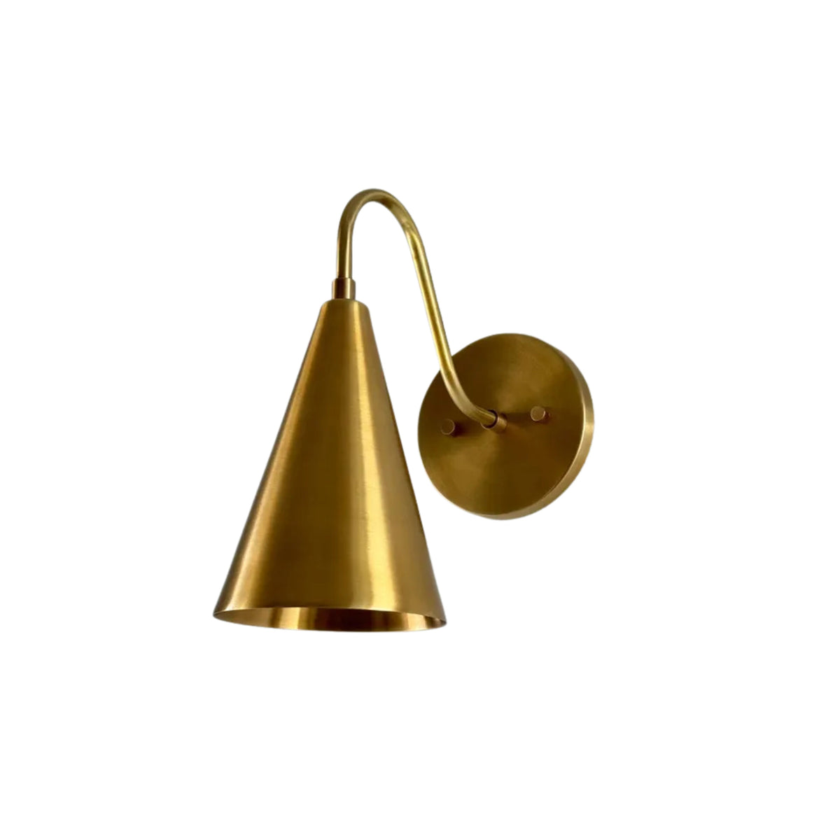 Angled view of the Luna Modern Curved Cone Wall Sconce showcasing the tapered cone shade, elegant curved arm, and minimalist round wall canopy in a warm brass finish.