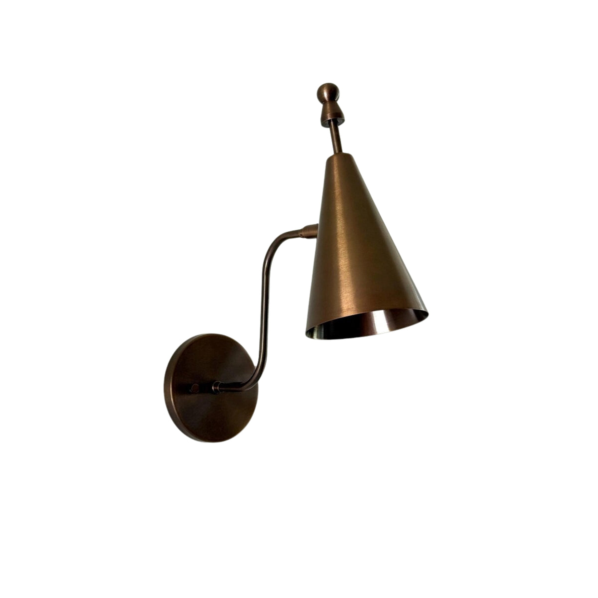 Side perspective of the Luna Modern Tapered Cone Wall Sconce highlighting the handcrafted cone shade, curved metal arm, and decorative finial with a warm antique bronze finish.