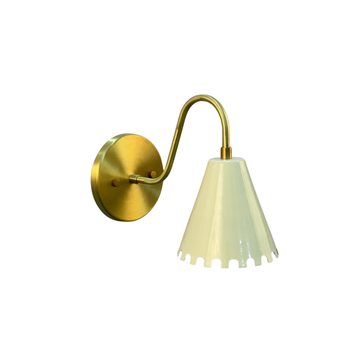 Luna Scalloped Cone Wall Sconce featuring a curved solid brass arm with a handcrafted white scalloped cone metal shade, angled front product view.