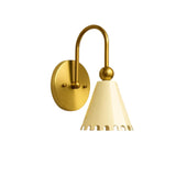 Front view of the Luna Scalloped Cone Wall Sconce with white scalloped cone shade, solid brass frame, spherical accent, and circular wall mount.