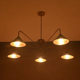 Luxury brass chandelier with black and gold cone shades, perfect for living rooms and entryways.