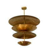 Mallorca 8 light brass-tone sculptural tiered disc chandelier shown in a close-up angled view with layered bowl shades.
