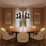 Manhattan 12 light chandelier shown from the front with deep blue double-cone shades, white interiors, and brass-tone radial arms.