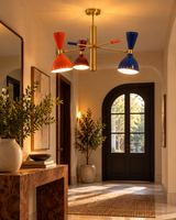 Manhattan 6-light multicolor Sputnik chandelier illuminating a sophisticated entryway with wooden console table, decorative greenery, and arched doorway.